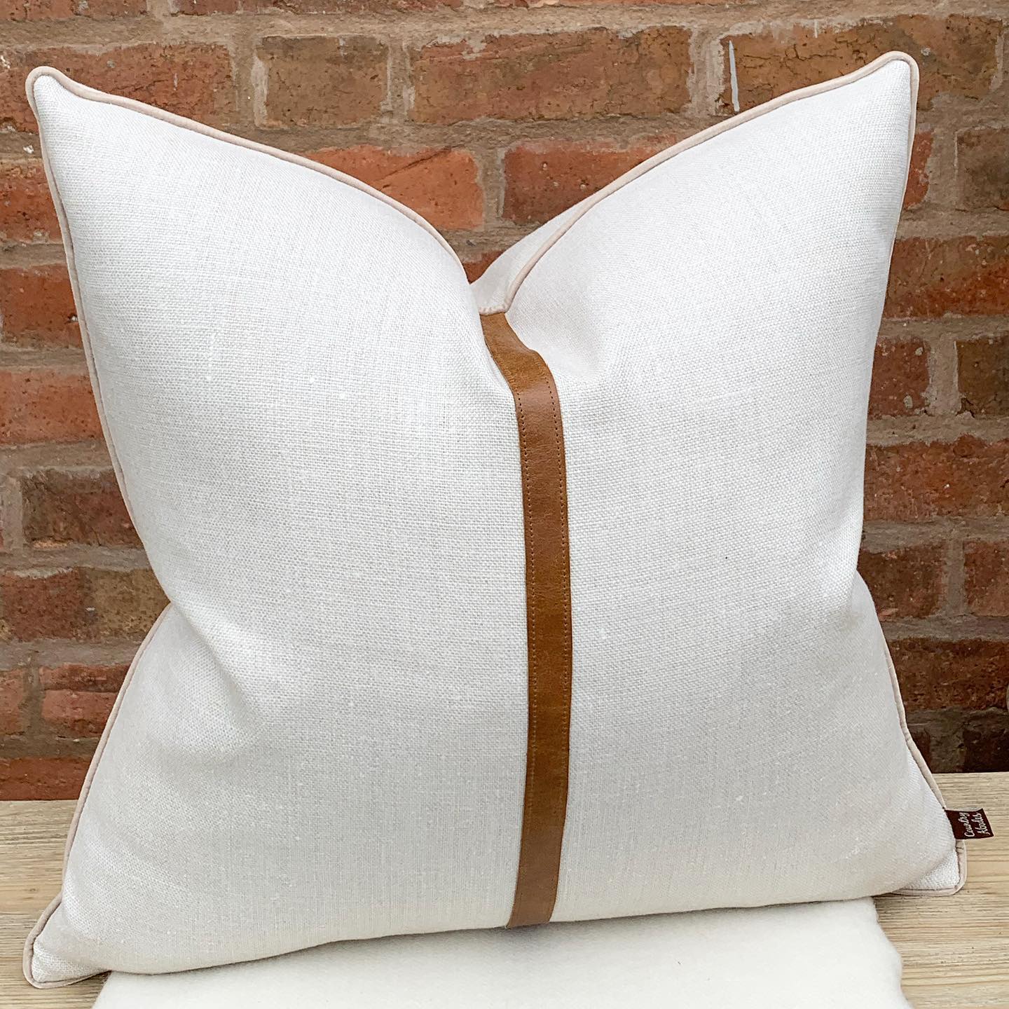 Peony and Sage grain sack cushion with leather detail